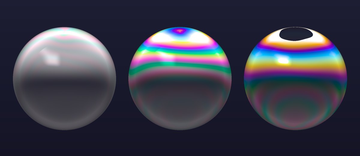 Three soap bubbles side by side on a dark background. The left one is almost colorless, with faint pink and green washes. The middle one has vivid bands of magenta, green and blue around its upper half. The right one has a black spot at its top, ringed by white and gold, then purple, blue, yellow and green bands below.